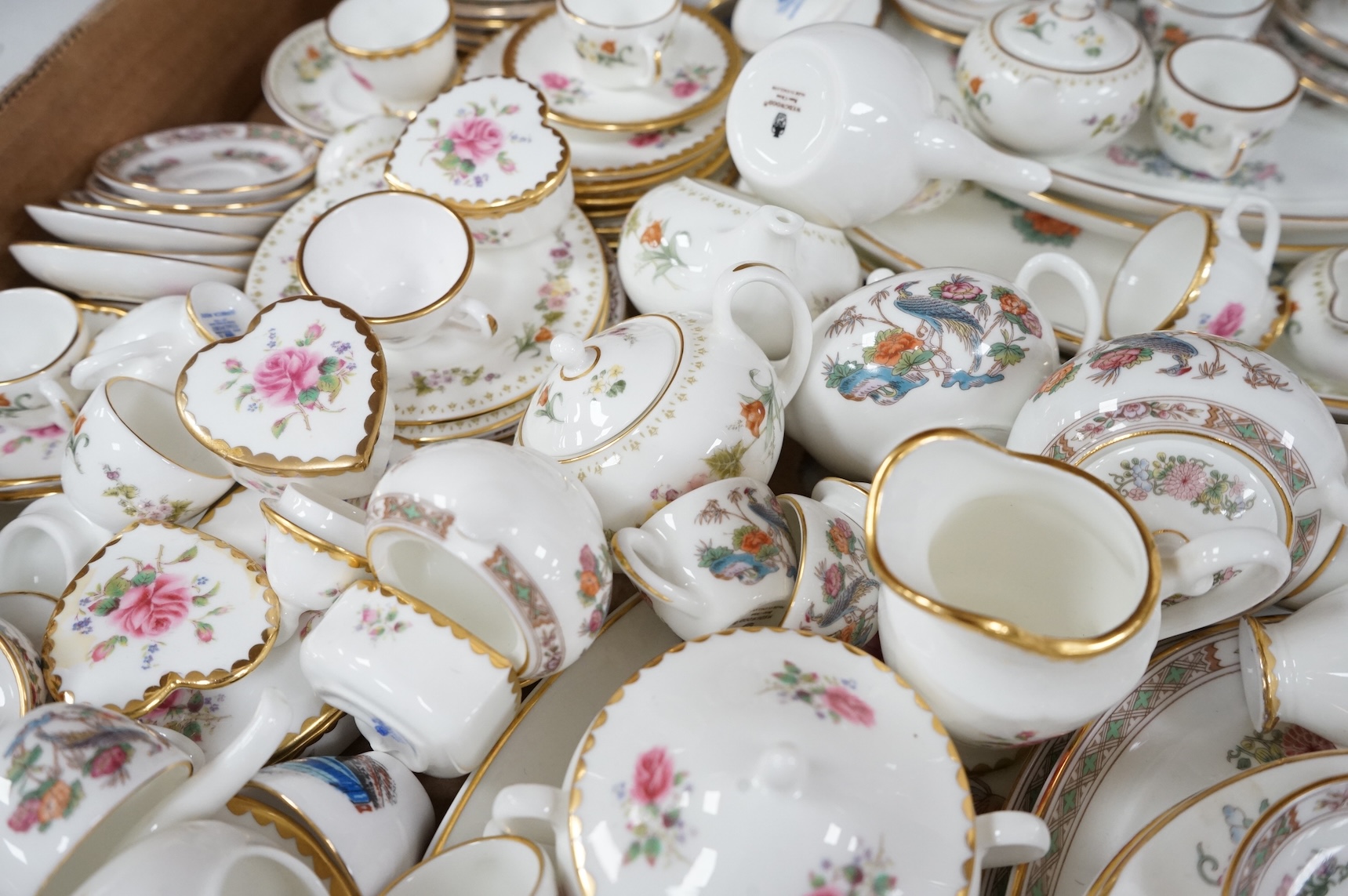 A large collection of Wedgwood and Coalport miniature tea wares, largest piece 24cm wide
